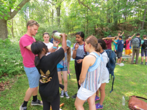 Demonstrating turbidity to students from Greenhills School in Ann Arbor, Michigan during my first co-op at a Huron River Watershed Council Stream-Side Day.
