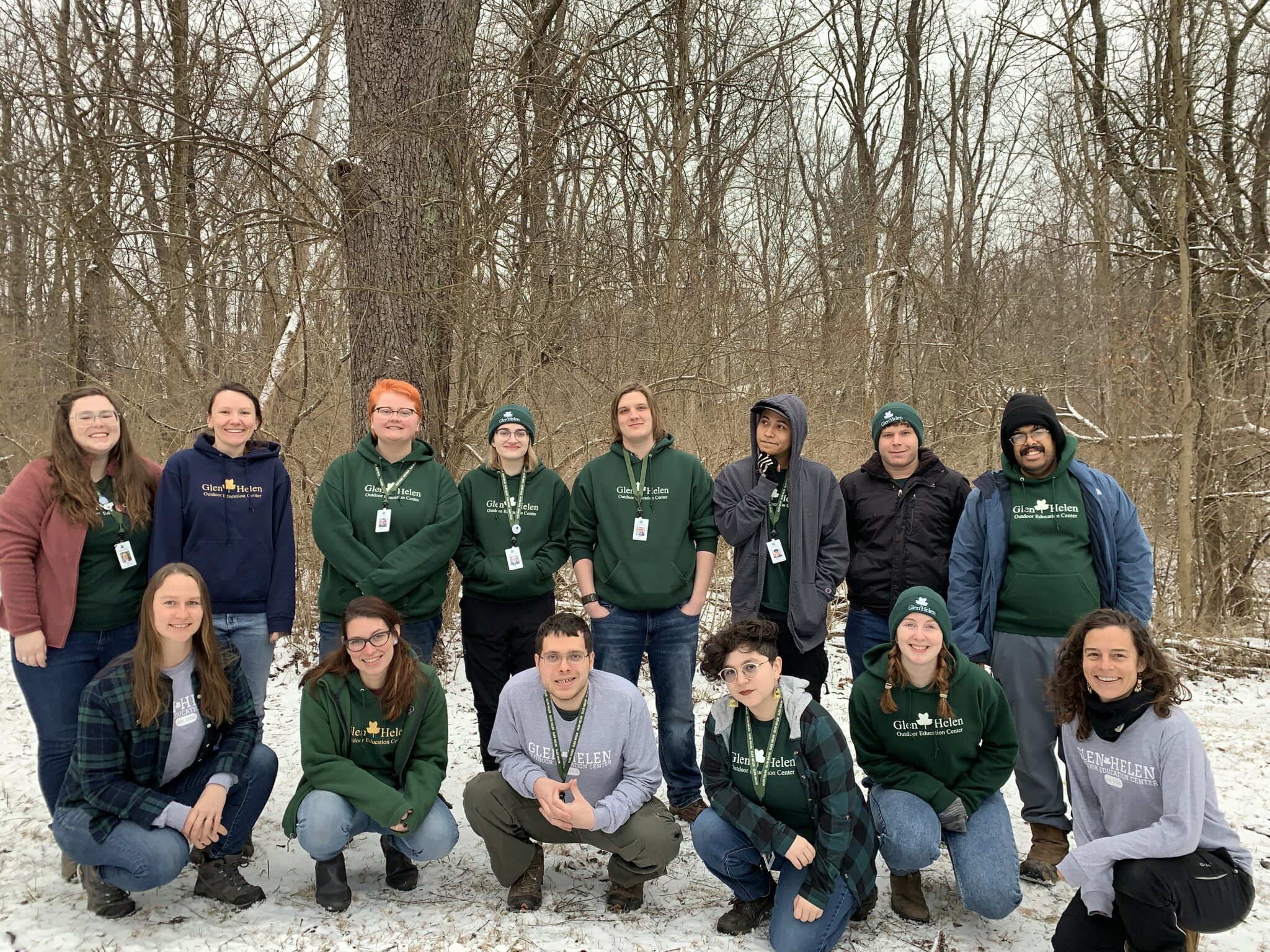 A group photo of all naturalists, including Rosabella, outside in the snow.